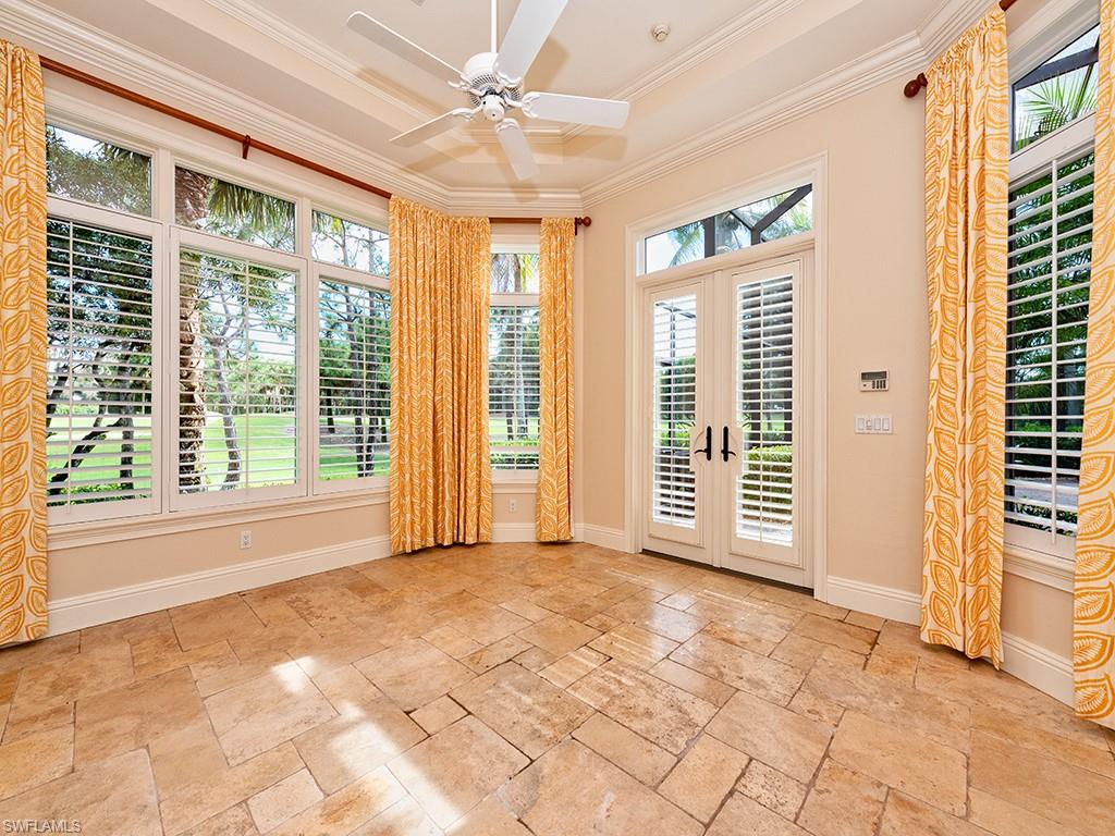 3110 Dahlia Way Naples, FL 34105 - Photo 33 of 35 a view of a livingroom with a swimming pool