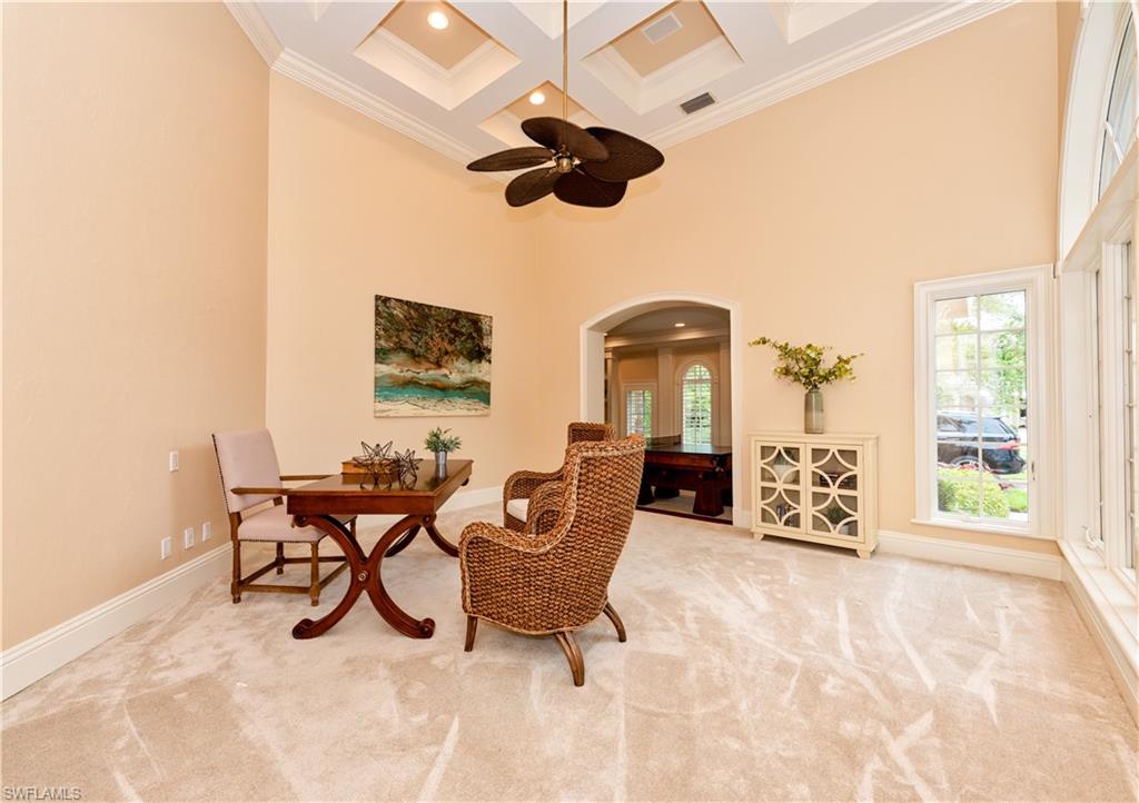 3110 Dahlia Way Naples, FL 34105 - Photo 7 of 35 a dining room with furniture and a large window