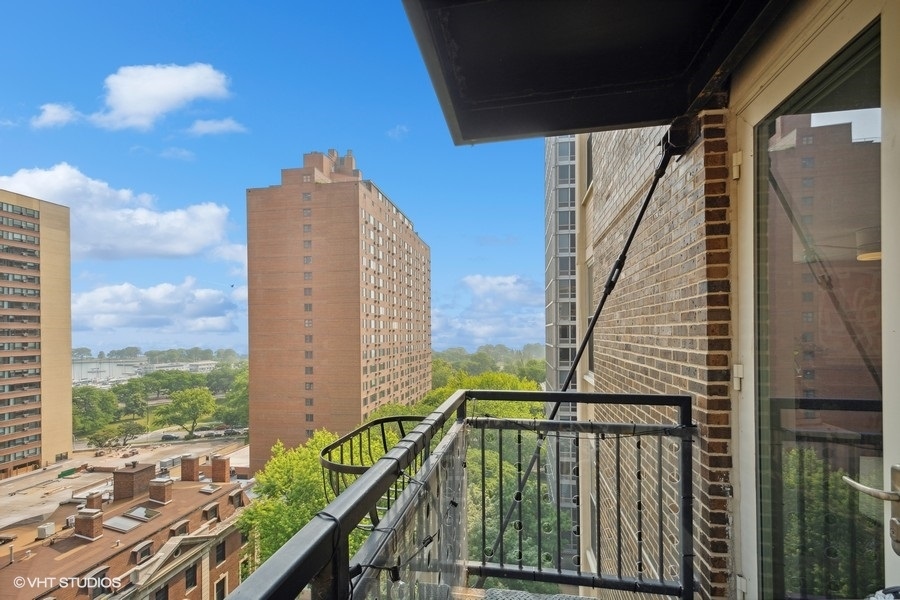 3033 North Sheridan Road, Unit 1201 Chicago, IL 60657 - Photo 15 of 16 a view of balcony with furniture