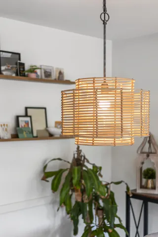 a bathroom with a bathtub and a window