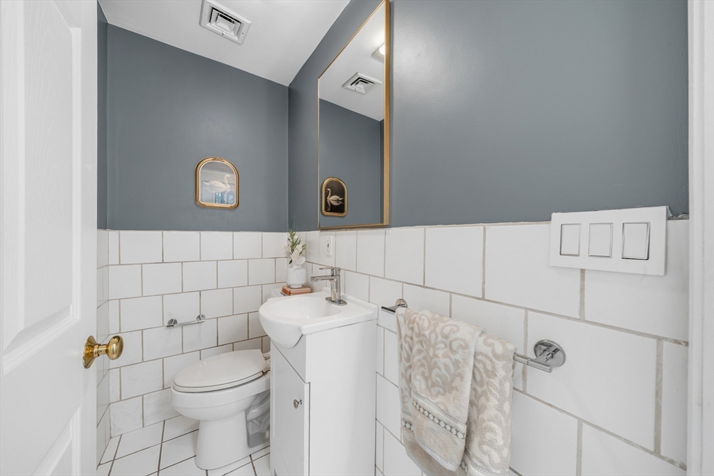 93 Baldwin Street, Unit 1 Boston, MA 02129 - Photo 15 of 30 a bathroom with a toilet and a shower