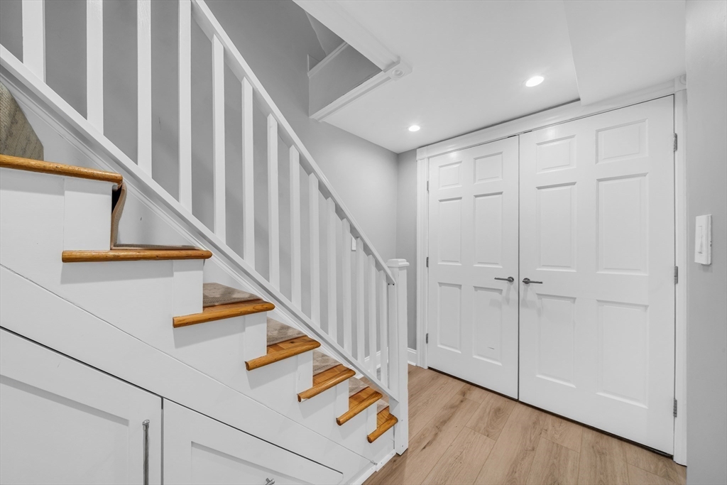 93 Baldwin Street, Unit 1 Boston, MA 02129 - Photo 17 of 30 a view of entryway and hall with wooden floor