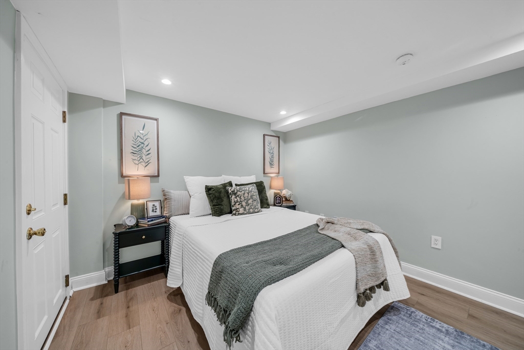 93 Baldwin Street, Unit 1 Boston, MA 02129 - Photo 20 of 30 a bedroom with a bed and a walk in closet