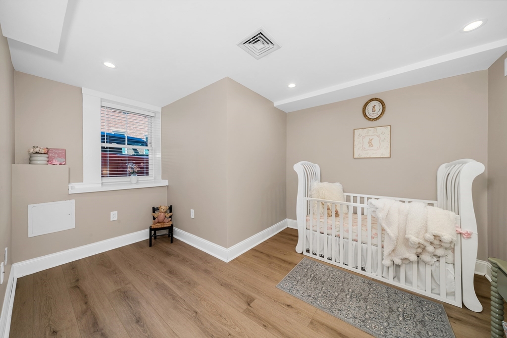 93 Baldwin Street, Unit 1 Boston, MA 02129 - Photo 24 of 30 a view of livingroom with furniture and wooden floor