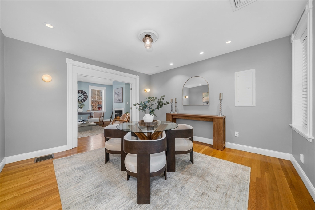93 Baldwin Street, Unit 1 Boston, MA 02129 - Photo 5 of 30 a living room with furniture and a wooden floor