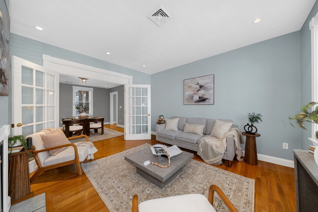 93 Baldwin Street, Unit 1 Boston, MA 02129 - Photo 8 of 30 a living room with furniture rug and window