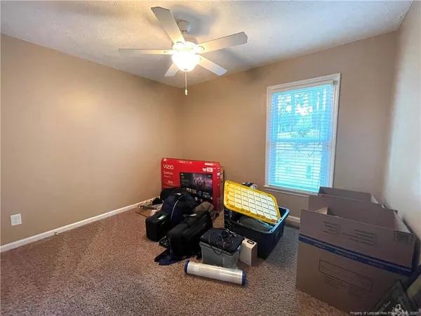 a room with furniture and a window