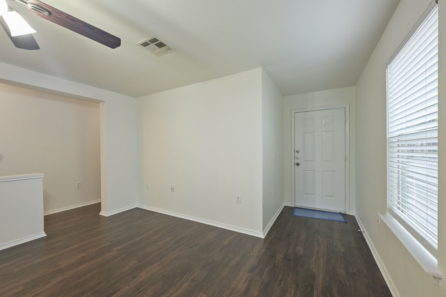 6733 Doyal Drive Austin, TX 78747 - Photo 17 of 28 A well-lit entry with rich wood flooring welcomes you home.