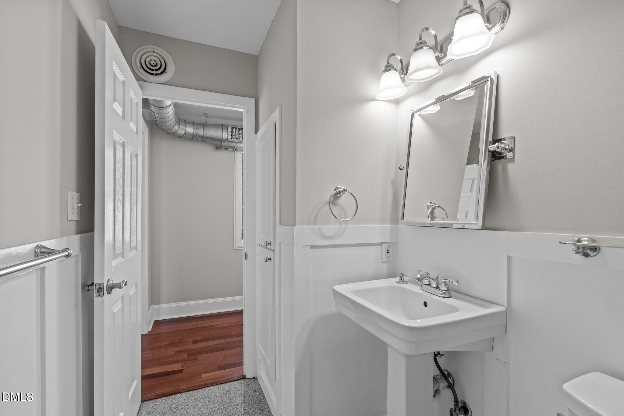 2208 Stafford Avenue Raleigh, NC 27607 - Photo 13 of 30 a bathroom with a sink a toilet and shower
