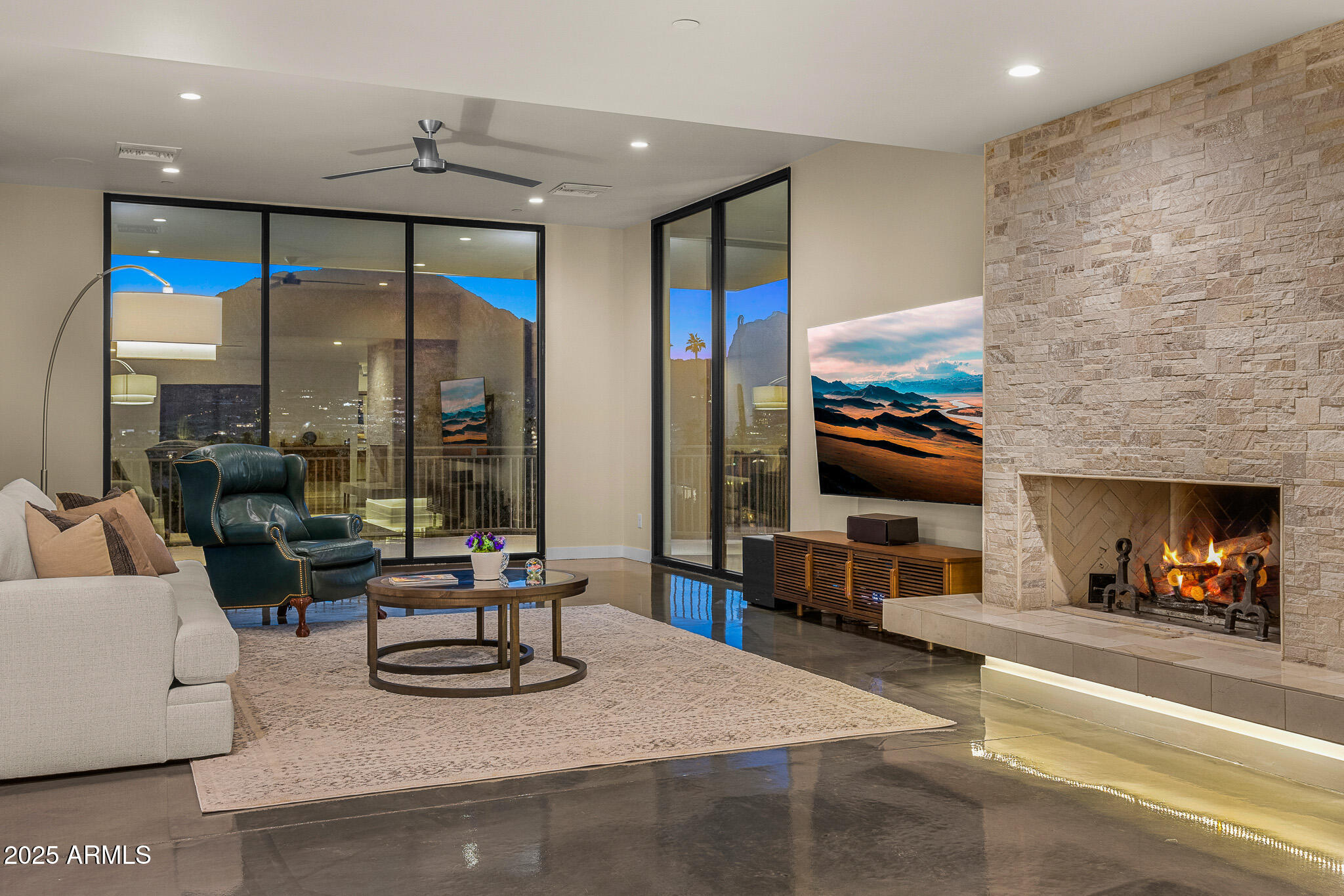 5826 East Indian Bend Road Paradise Valley, AZ 85253 - Photo 52 of 58 a living room with furniture and a flat screen tv