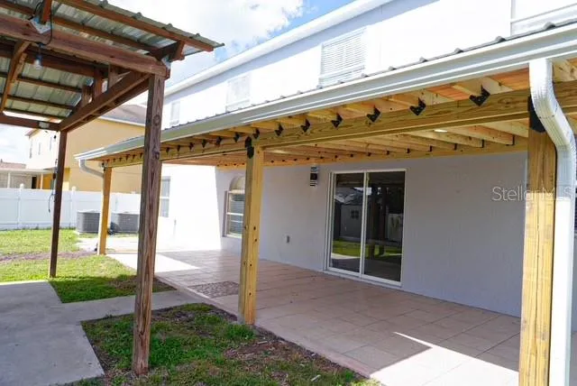 a front view of a building with garden