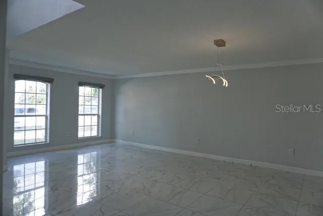 a front view of a house with entryway and windows