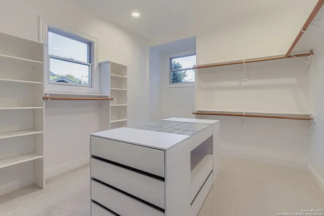 a utility room with washer and dryer