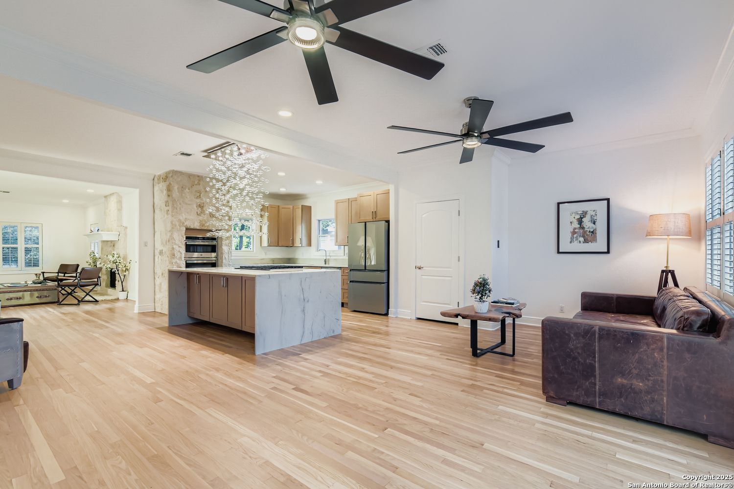 211 Elizabeth Road Terrell Hills, TX 78209 - Photo 8 of 29 a view of kitchen with cabinets and wooden floor