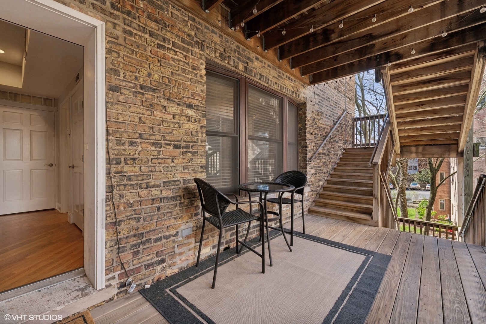 1016 Main Street, Unit 2 Evanston, IL 60202 - Photo 16 of 18 a patio with table and chairs