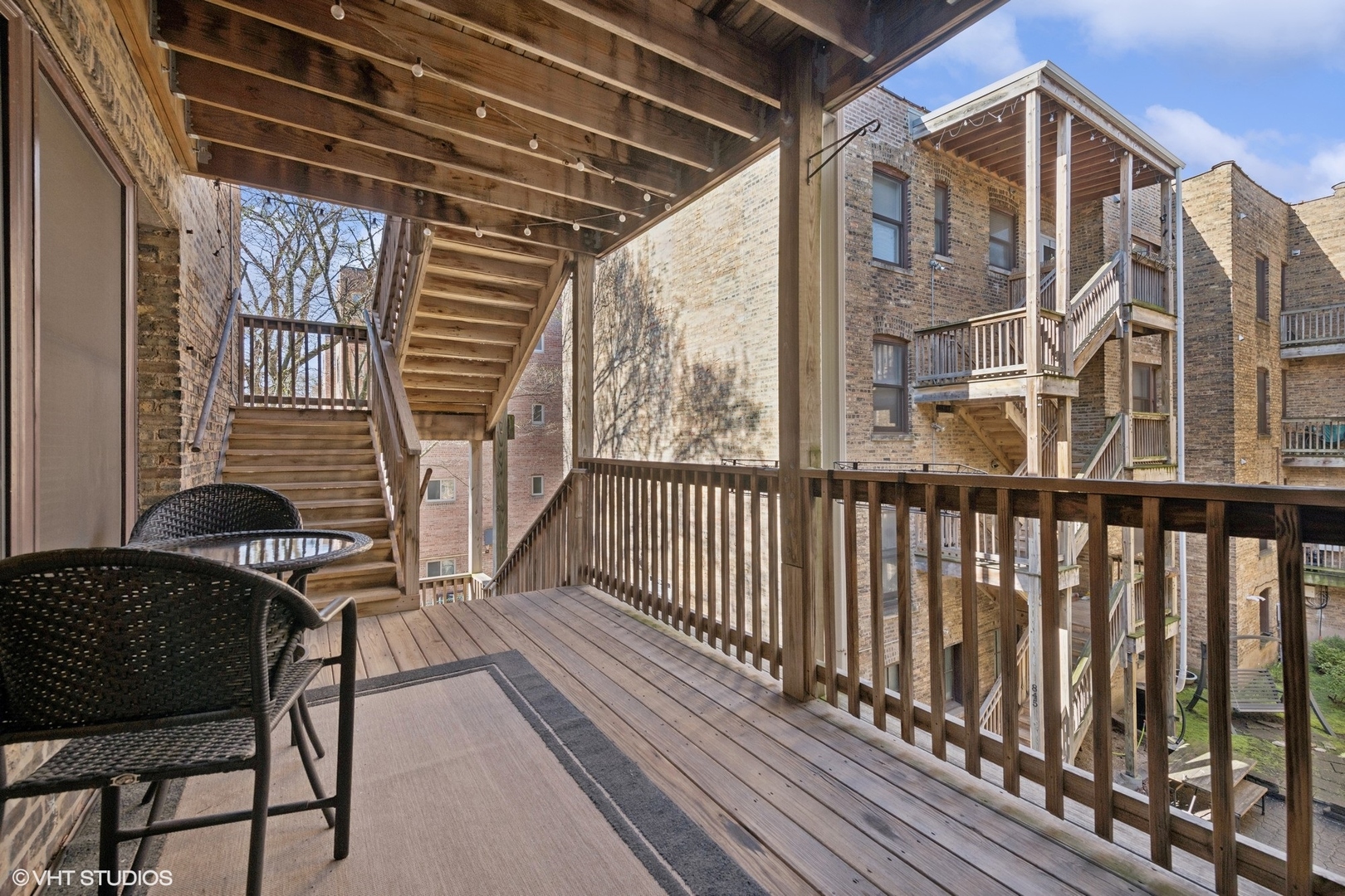 1016 Main Street, Unit 2 Evanston, IL 60202 - Photo 17 of 18 a view of a balcony with furniture