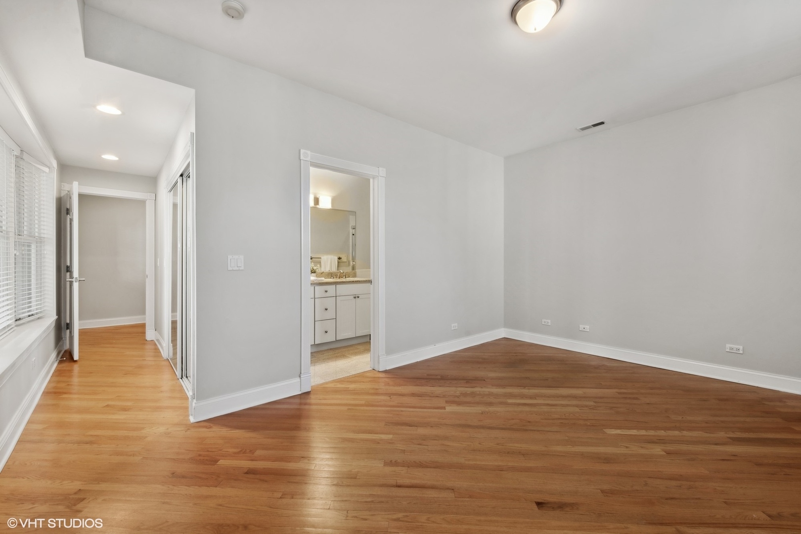 1016 Main Street, Unit 2 Evanston, IL 60202 - Photo 10 of 18 a view of hallway with wooden floor