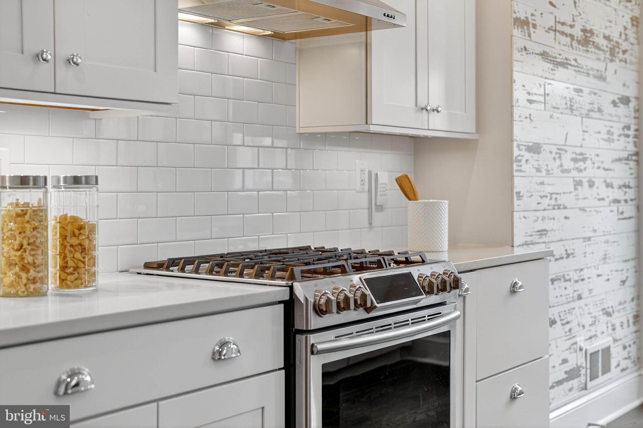 114 4th Street Northeast Washington, DC 20002 - Photo 12 of 40 a kitchen with a stove and a sink