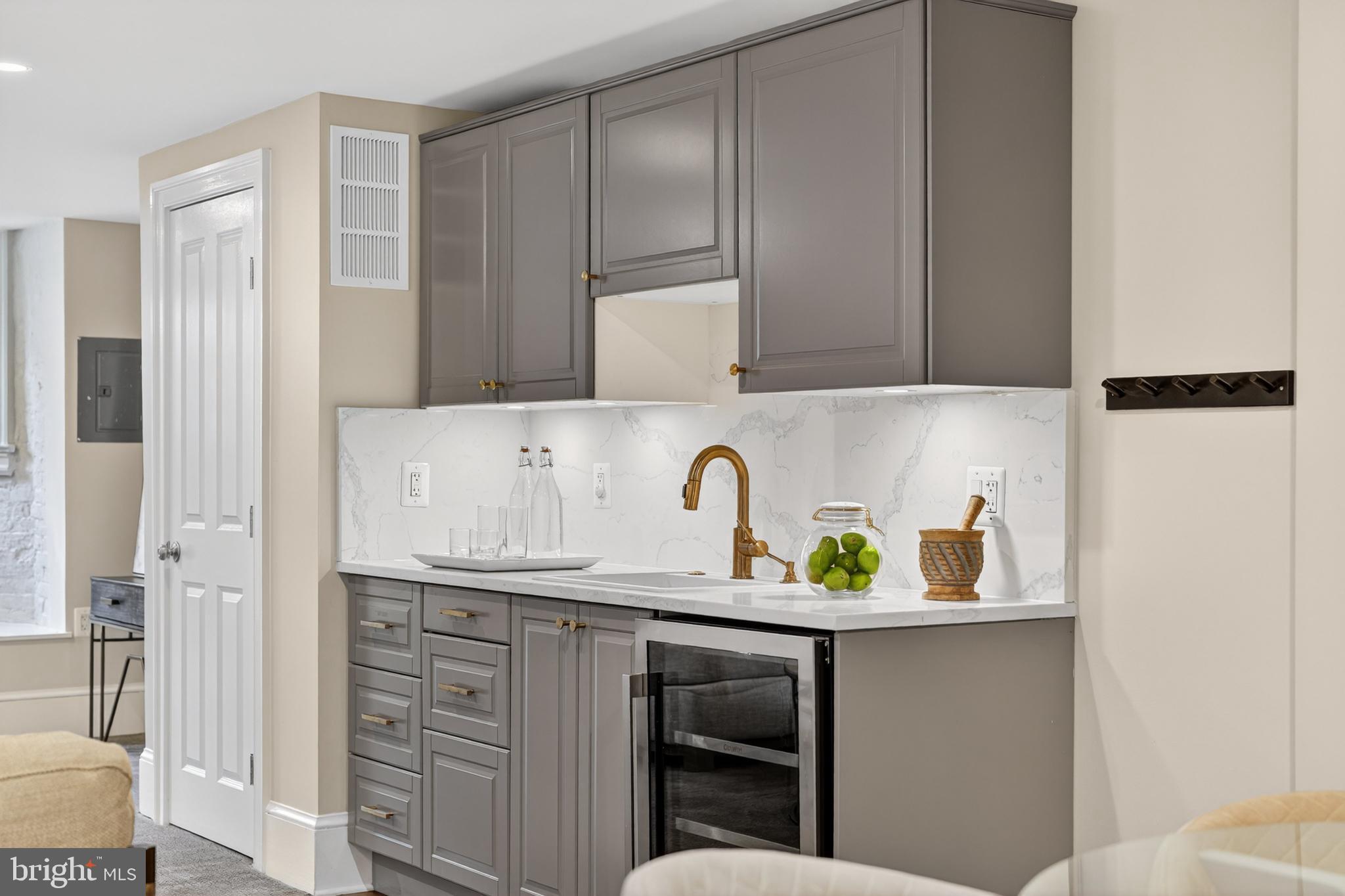 114 4th Street Northeast Washington, DC 20002 - Photo 32 of 40 a kitchen with a sink and a refrigerator