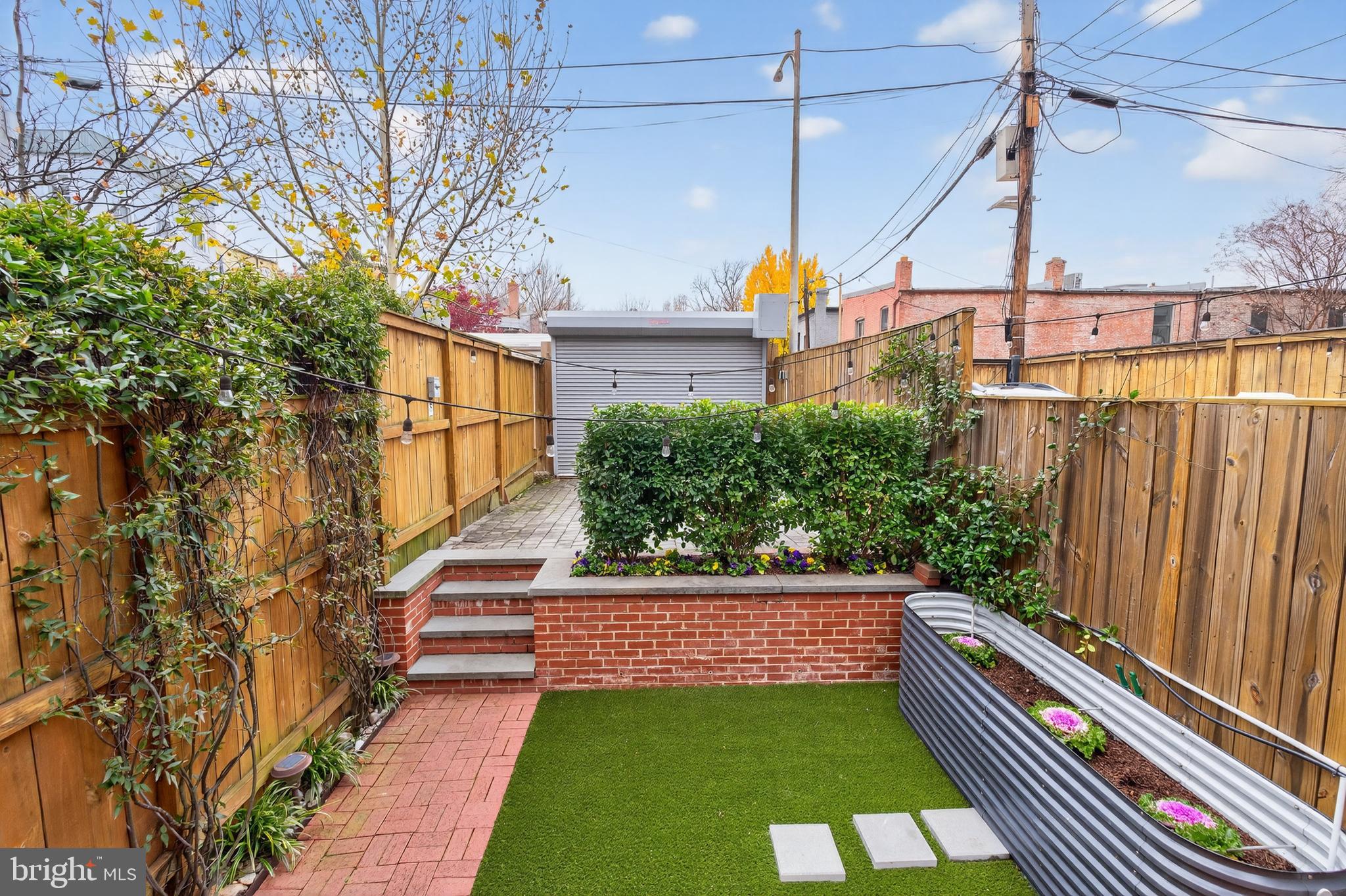 114 4th Street Northeast Washington, DC 20002 - Photo 36 of 40 a view of a yard with wooden fence