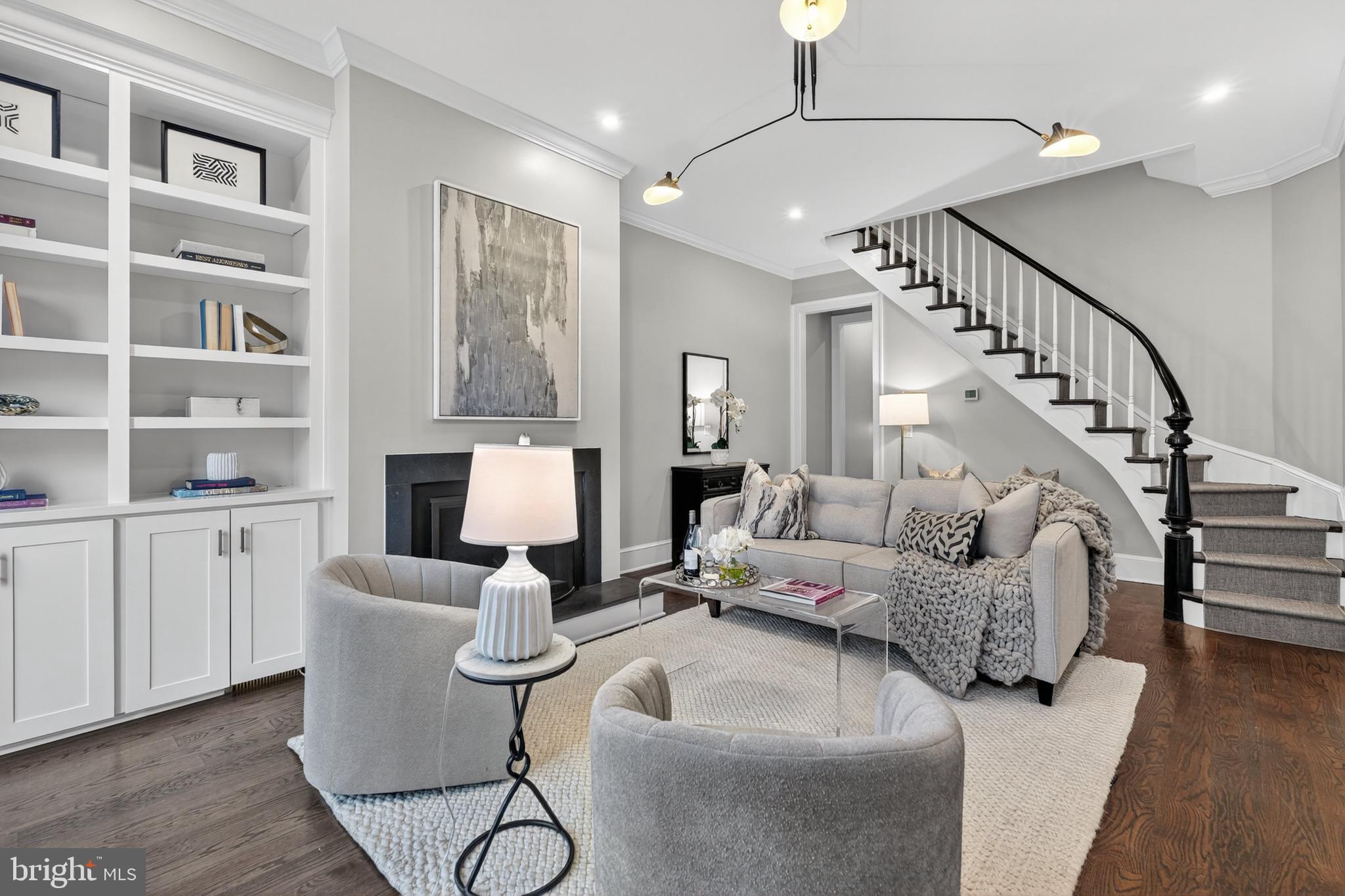114 4th Street Northeast Washington, DC 20002 - Photo 4 of 40 a living room with furniture potted plant and white walls