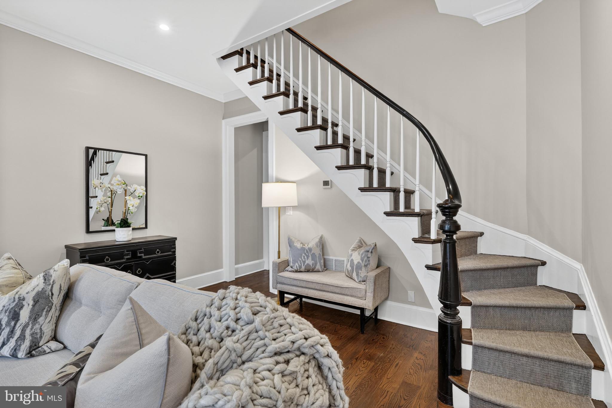 114 4th Street Northeast Washington, DC 20002 - Photo 6 of 40 a bedroom with furniture and a rug