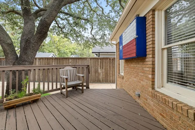 a view of deck with wooden floor and outdoor seating