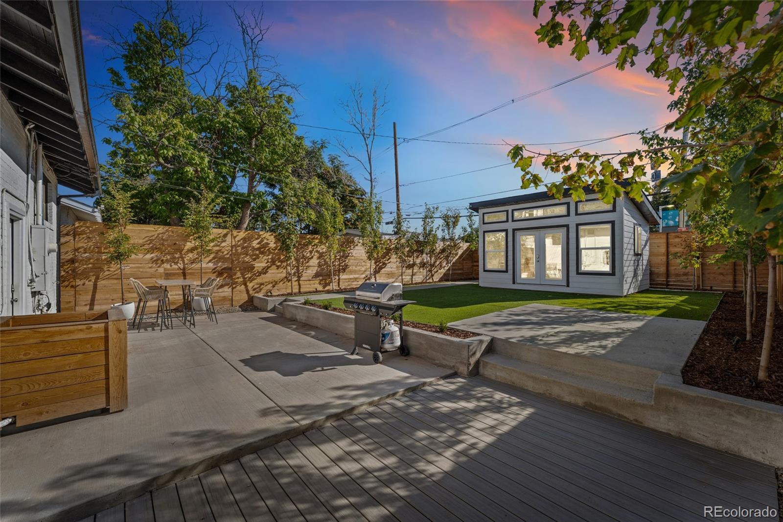 1528 Harrison Street Denver, CO 80206 - Photo 33 of 45 a view of a house with a yard