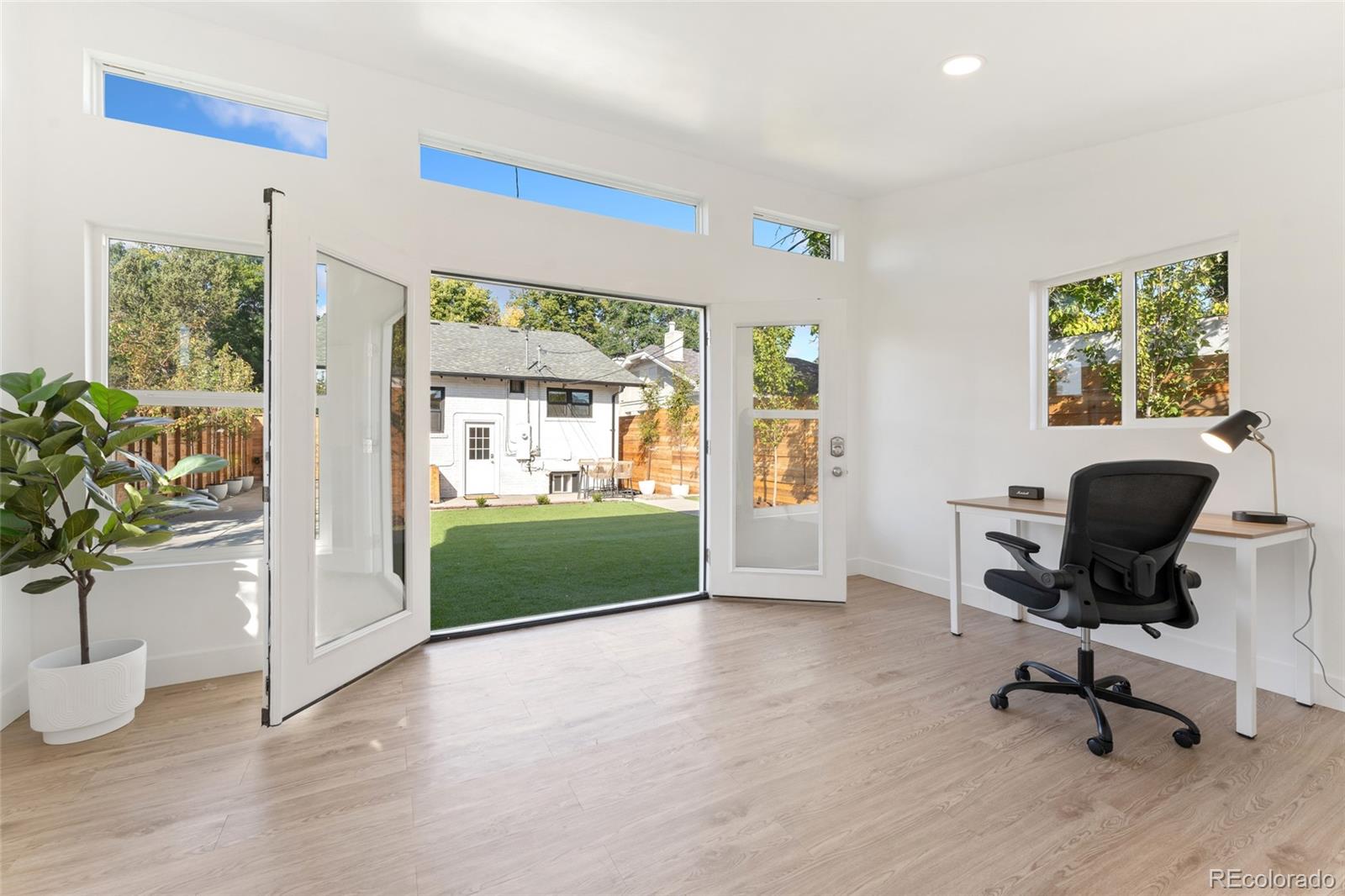 1528 Harrison Street Denver, CO 80206 - Photo 39 of 45 a view of a livingroom with a workspace