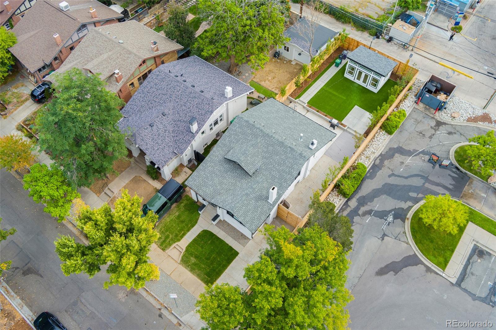 1528 Harrison Street Denver, CO 80206 - Photo 42 of 45 an aerial view of a house with a garden and swimming pool