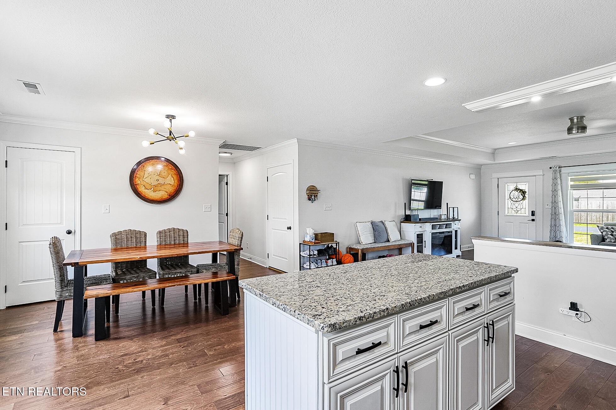 437 Covenant Way Seymour, TN 37865 - Photo 13 of 41 a kitchen with stainless steel appliances granite countertop a stove and a dining table