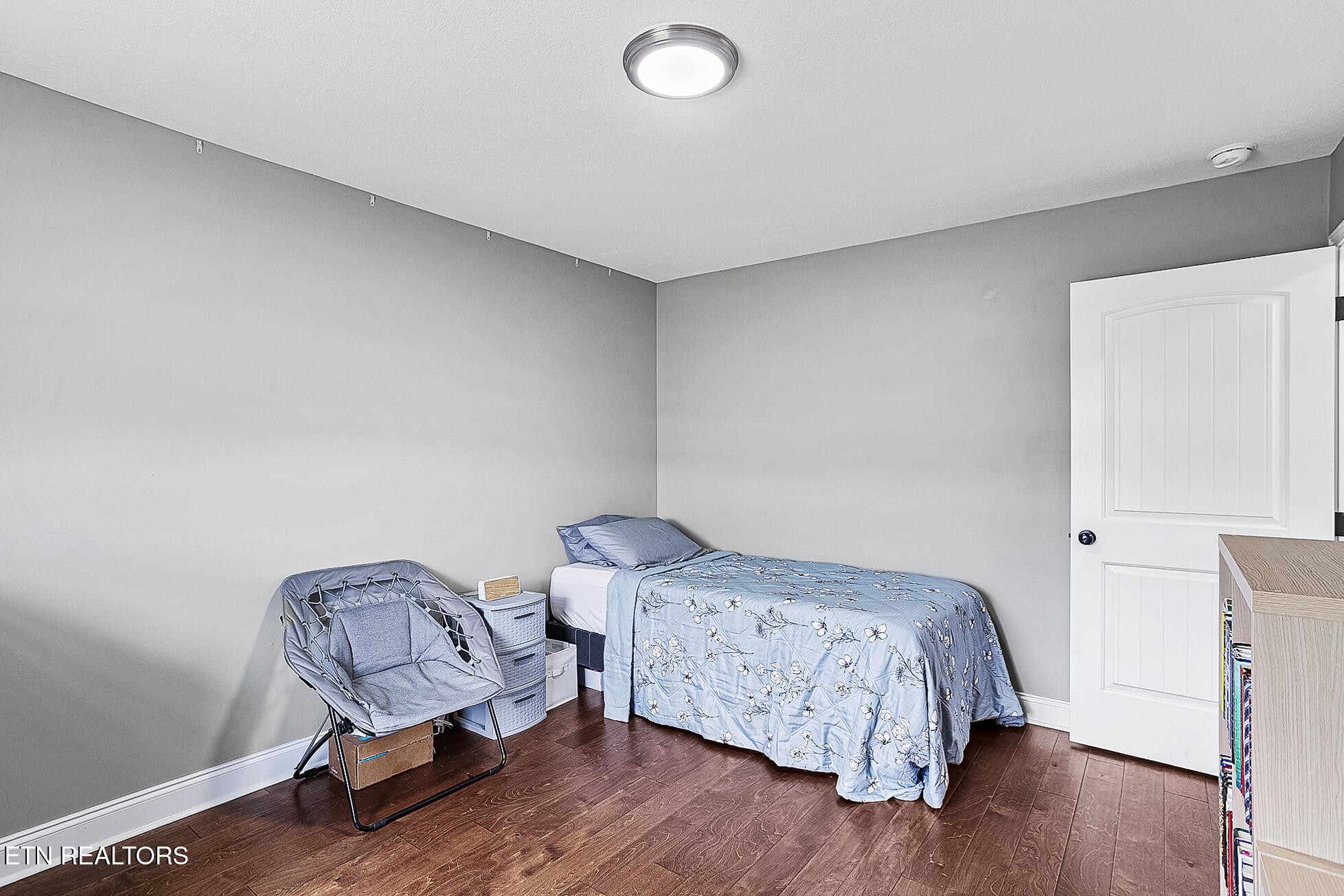 437 Covenant Way Seymour, TN 37865 - Photo 30 of 41 a bedroom with bed chair and wooden floor