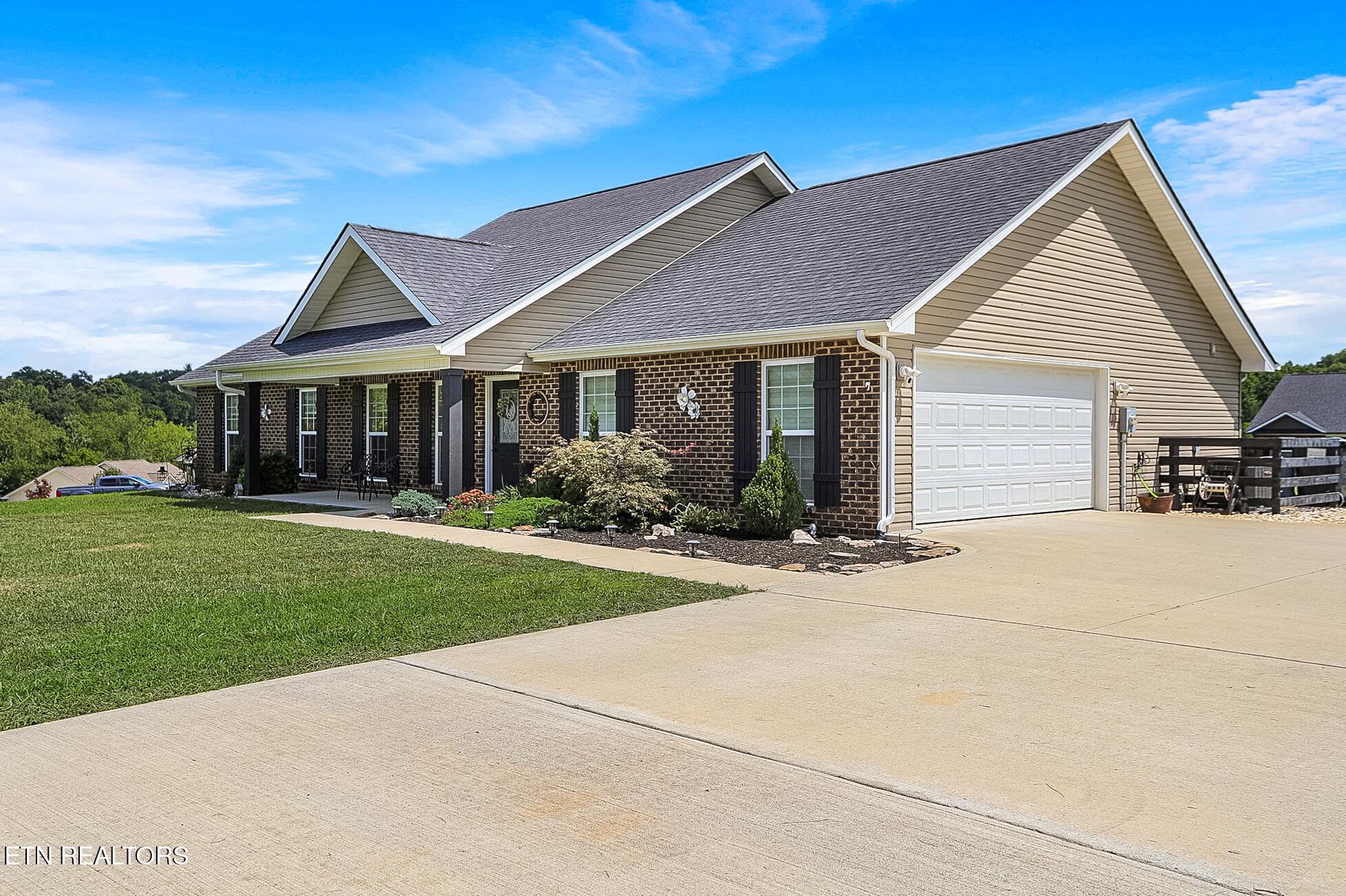 437 Covenant Way Seymour, TN 37865 - Photo 3 of 41 a front view of house with yard and green space