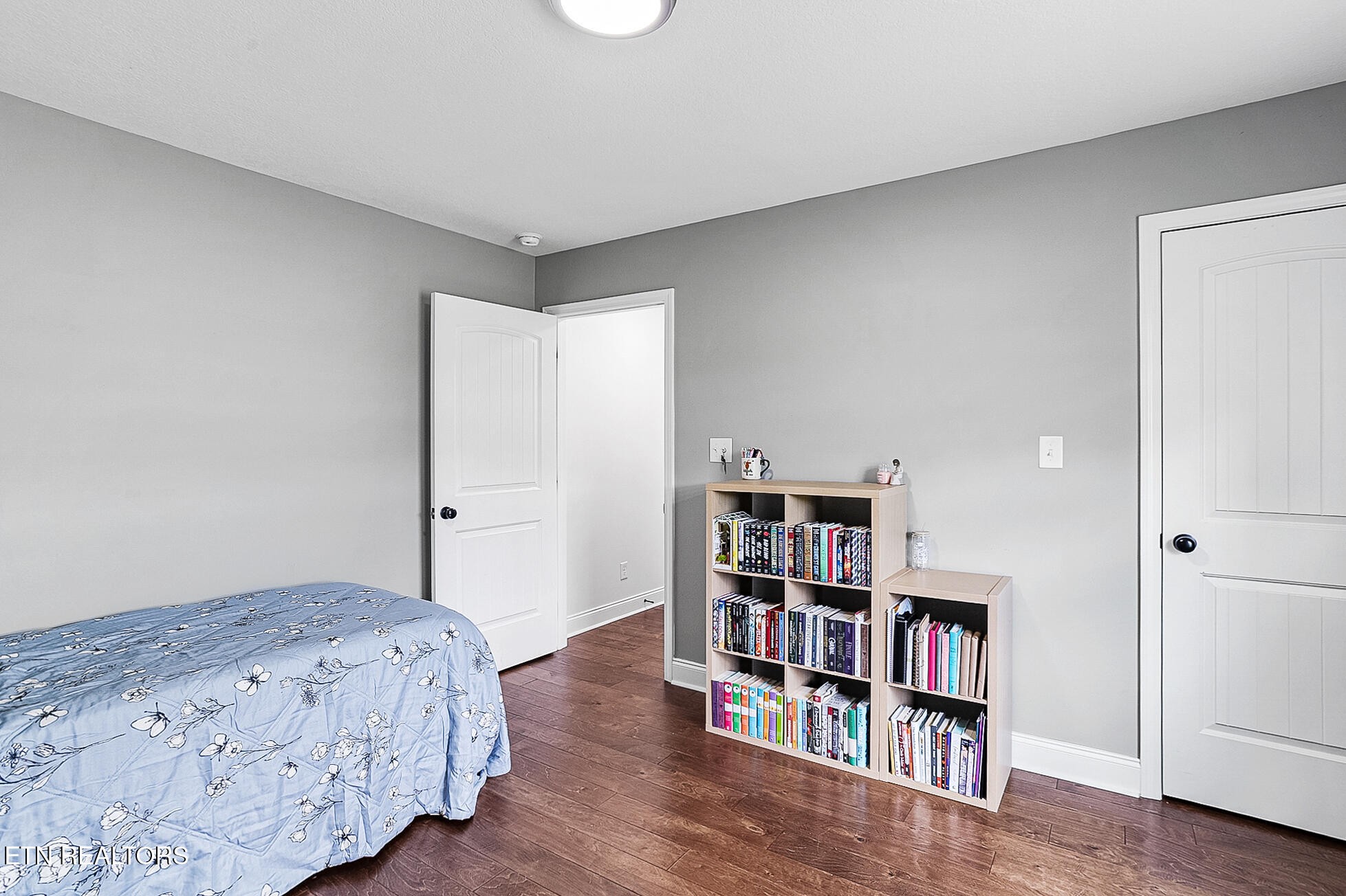 437 Covenant Way Seymour, TN 37865 - Photo 31 of 41 a bedroom with a bed and a book shelf