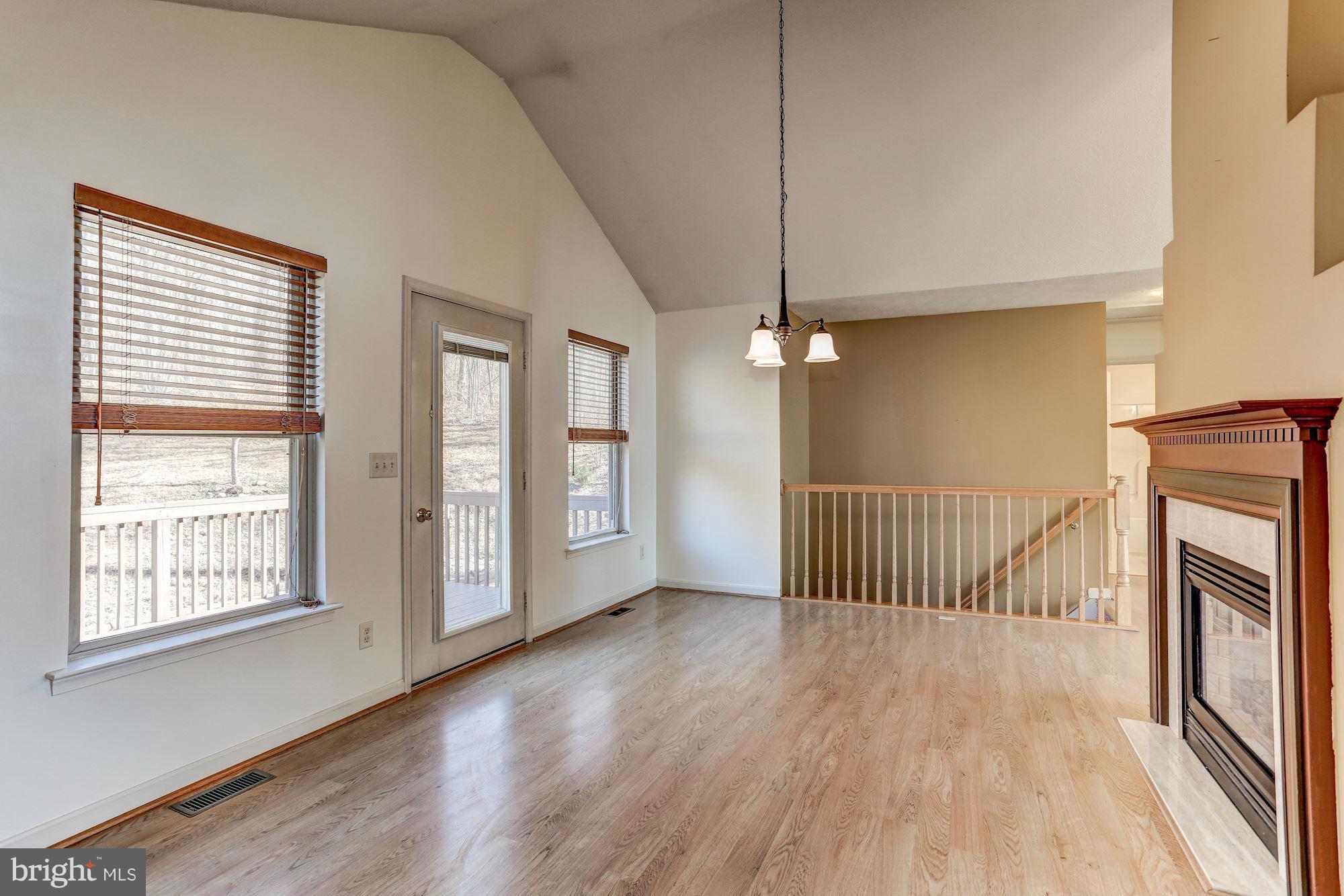 638 Freezeland Road Linden, VA 22642 - Photo 5 of 30 Dining Room flanked by 2-way fireplace and windows