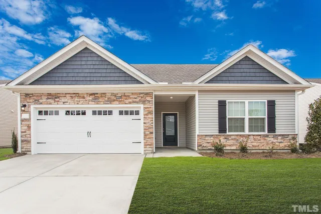 a view of a house with yard
