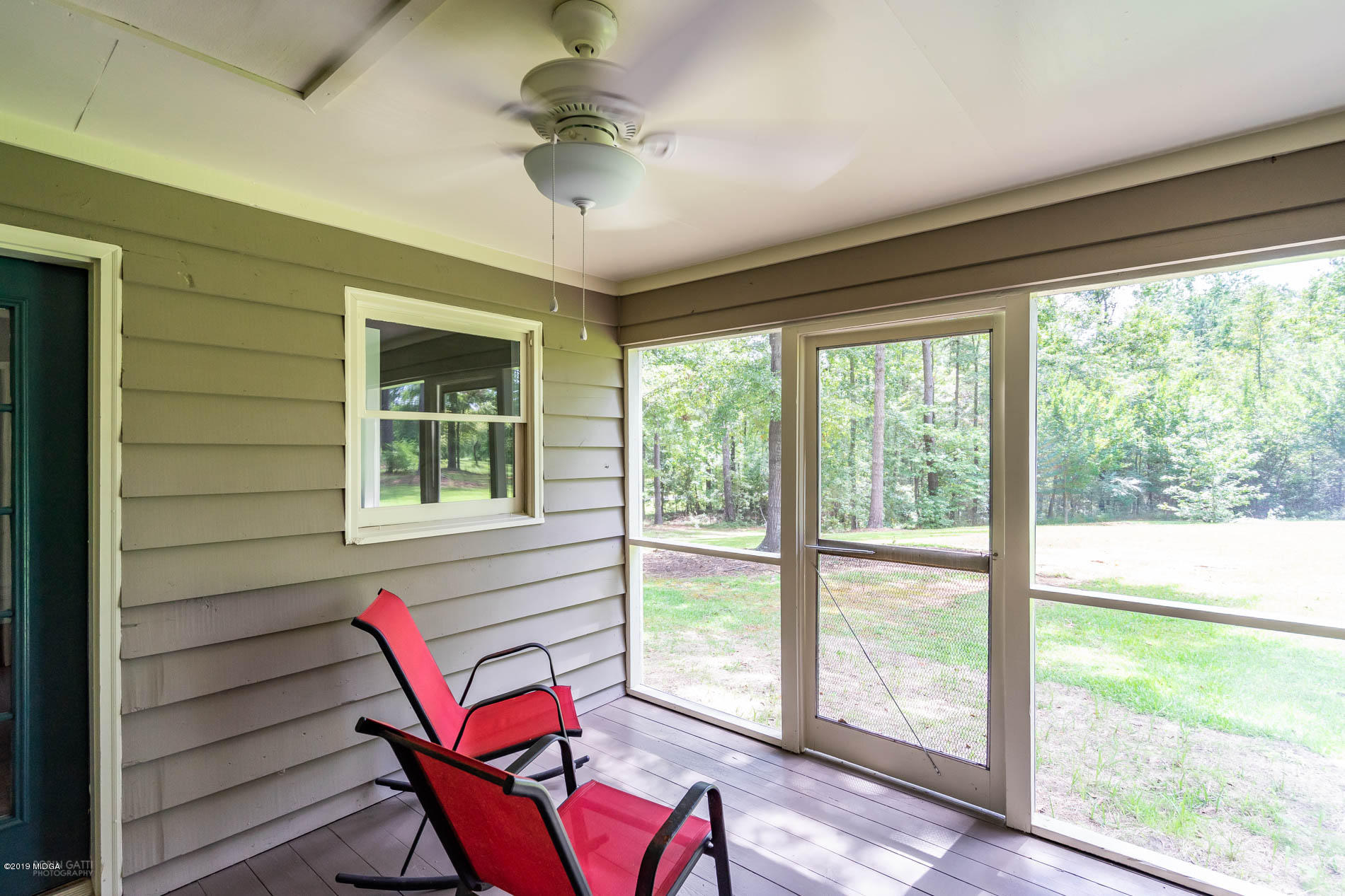 1041 Pate Road Juliette, GA 31046 - Photo 14 of 16 a view of a workspace with furniture and a window