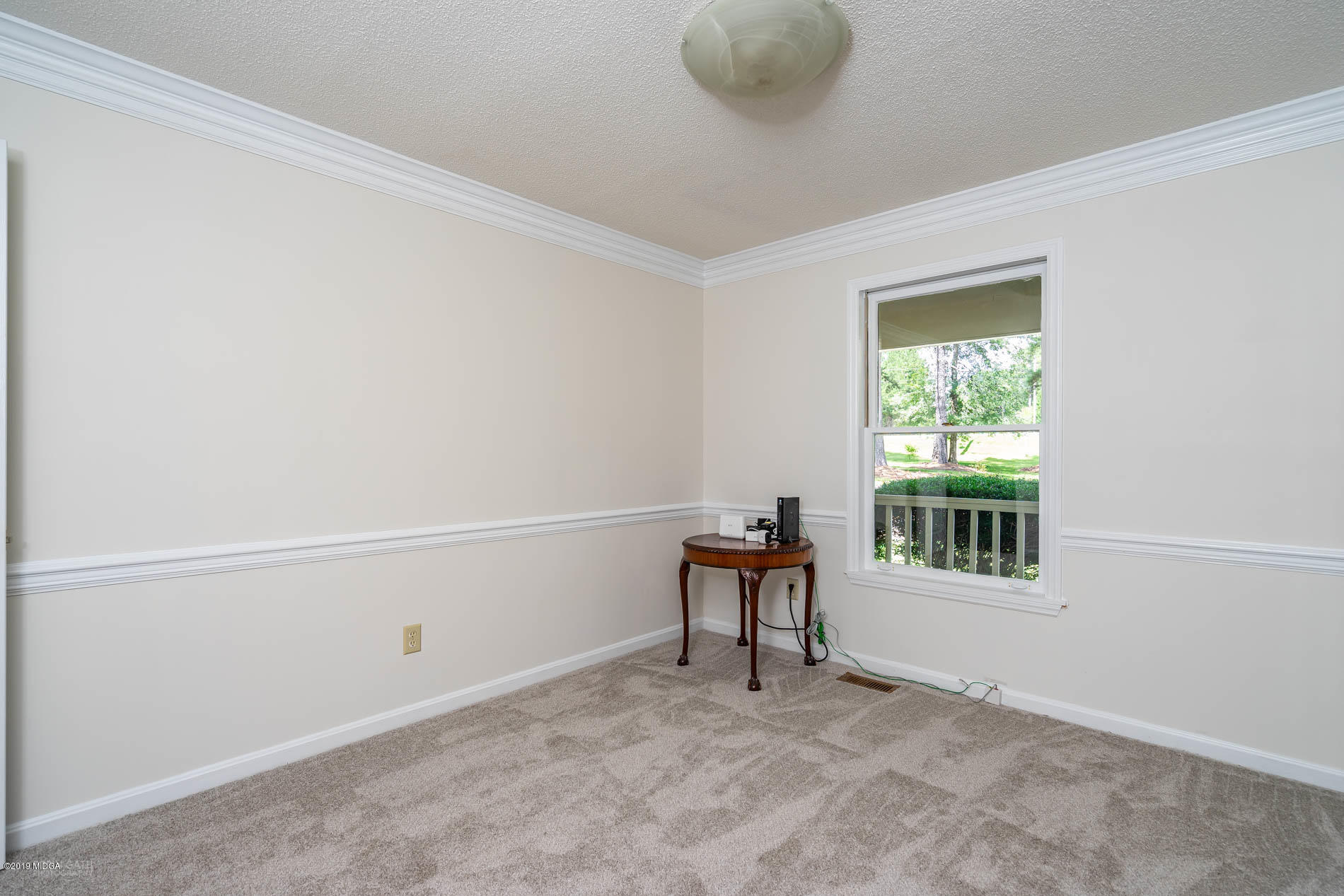 1041 Pate Road Juliette, GA 31046 - Photo 3 of 16 a view of an empty room with a window