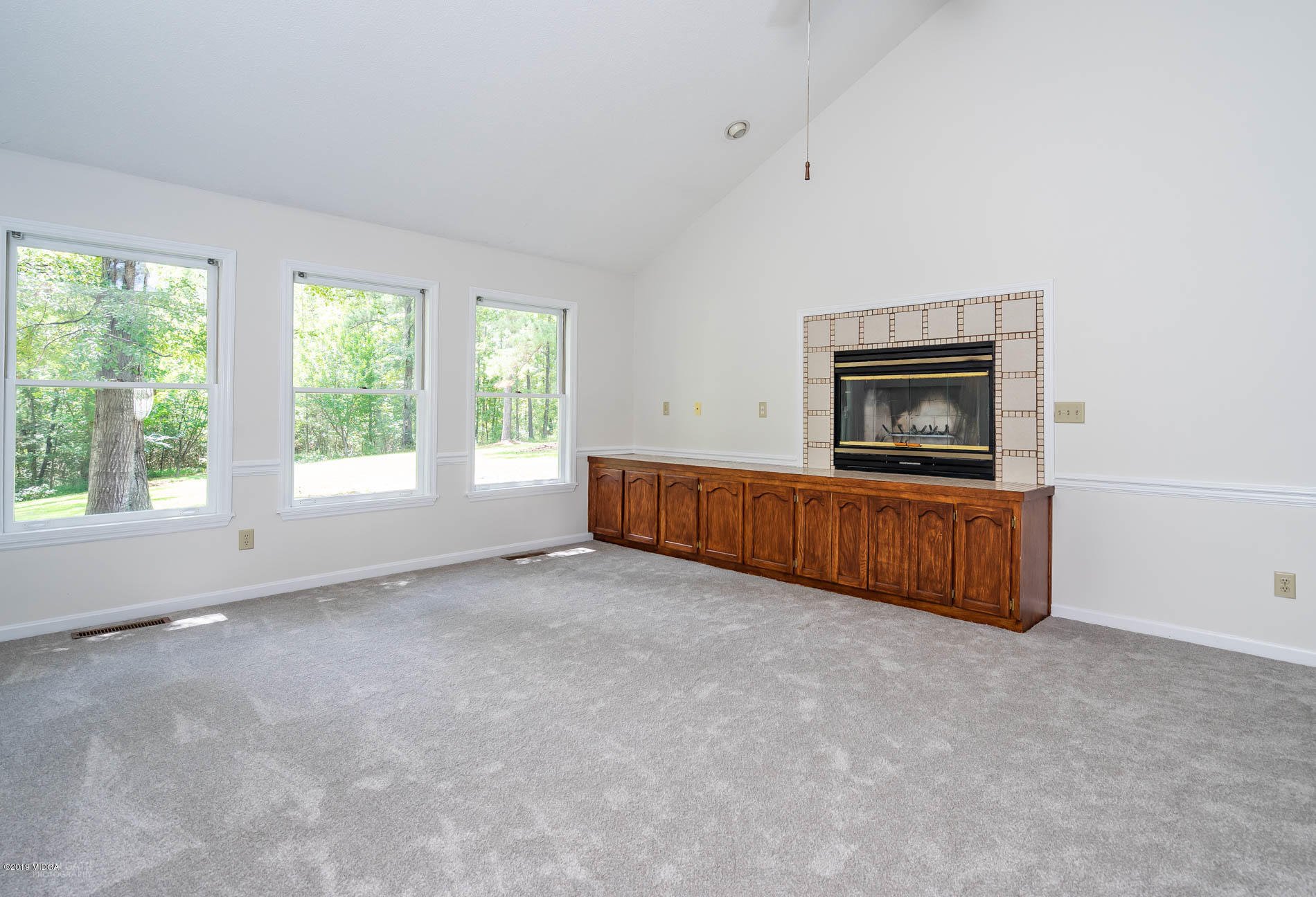 1041 Pate Road Juliette, GA 31046 - Photo 4 of 16 a living room with furniture and a fireplace