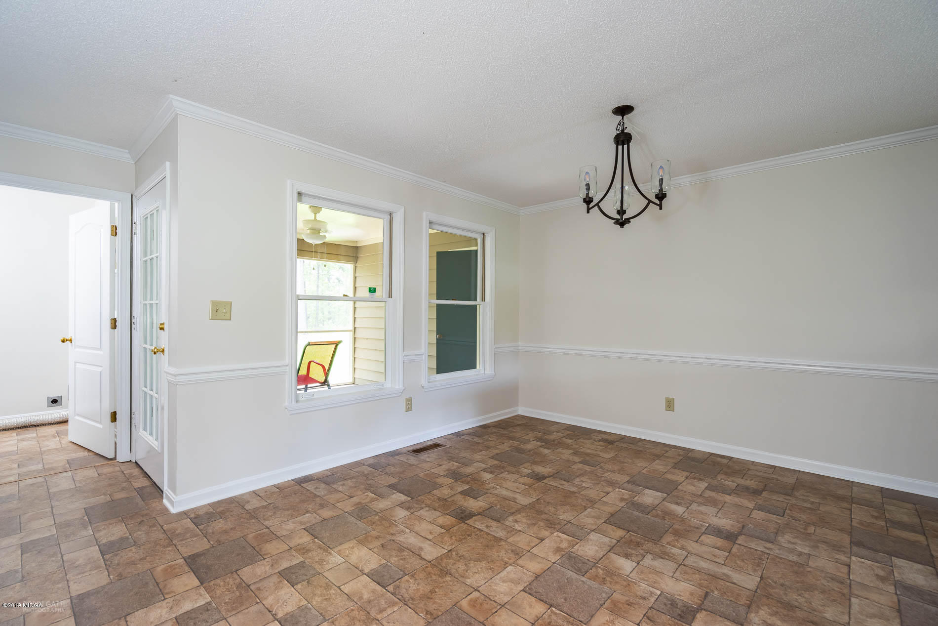 1041 Pate Road Juliette, GA 31046 - Photo 7 of 16 a view of an empty room with a window