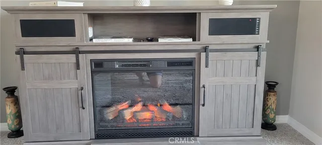 a living room with a fireplace