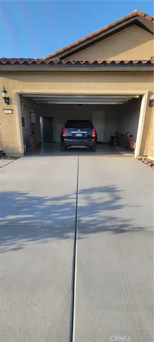 a view of backyard of a house