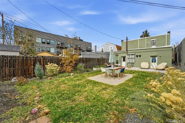 a building outdoor space with patio furniture and entertaining space