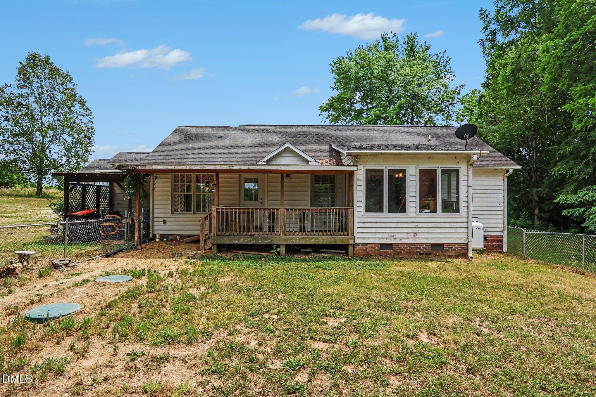 1750 Tom Oakley Road Timberlake, NC 27583 - Photo 25 of 31 a front view of a house with a yard
