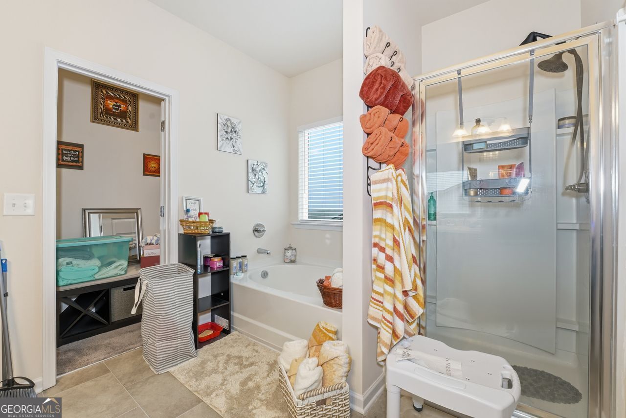 223 Malbone Street Southwest, Unit 5B Cartersville, GA 30120 - Photo 17 of 38 a bathroom with a sink toilet and shower