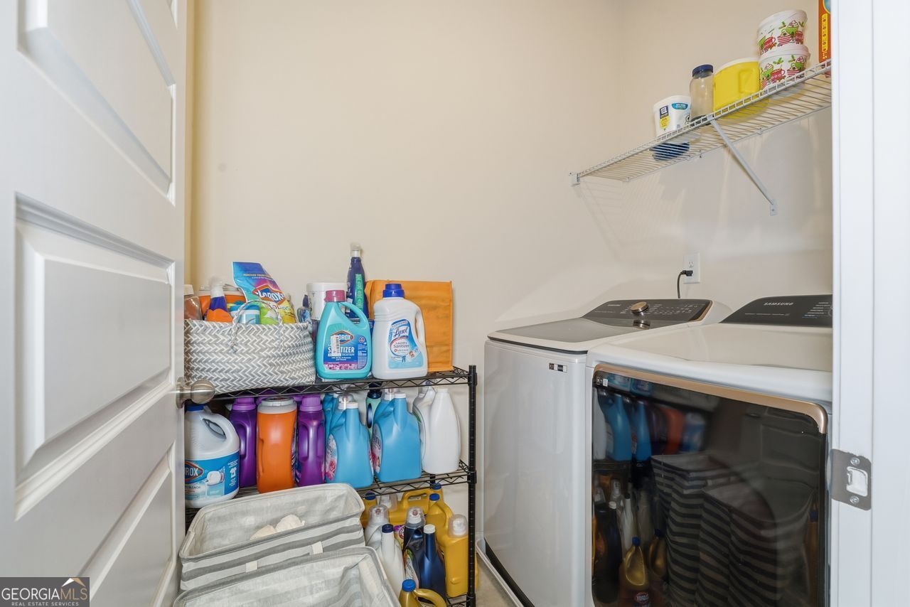 223 Malbone Street Southwest, Unit 5B Cartersville, GA 30120 - Photo 29 of 38 a utility room with dryer and washer