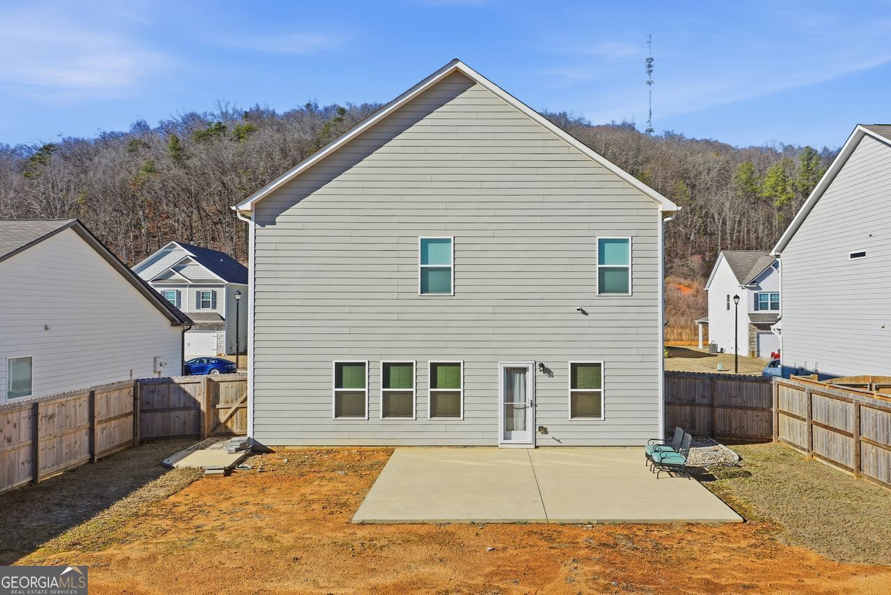 223 Malbone Street Southwest, Unit 5B Cartersville, GA 30120 - Photo 30 of 38 a view of a house with a patio