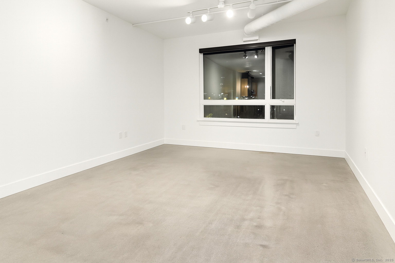 an empty room with a window