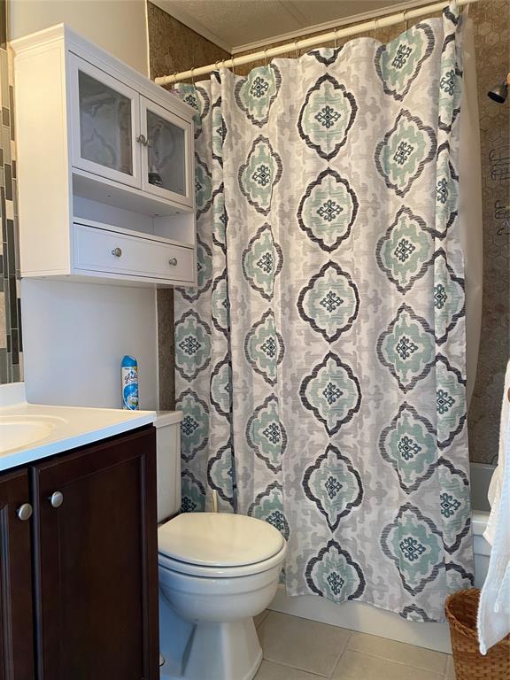 14629 Sunset Drive Delray Beach, FL 33445 - Photo 20 of 35 a bathroom with a toilet and sink