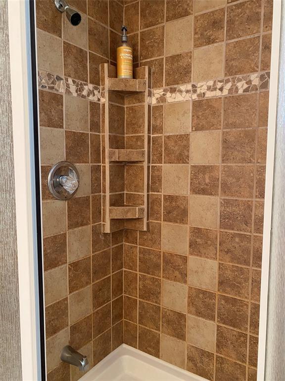 14629 Sunset Drive Delray Beach, FL 33445 - Photo 27 of 35 a bathroom with a shower